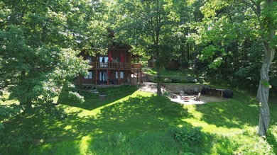 Escape to this cabin-style retreat with gorgeous river views and - photo 49
