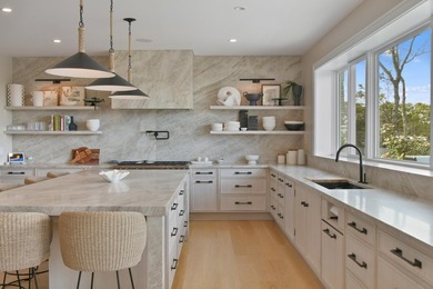 This stunning waterfront home is nestled within a coveted North - photo 11