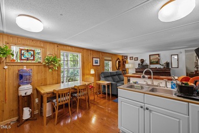 Welcome to a one-of-a-kind retreat nestled on 5.19 acres just