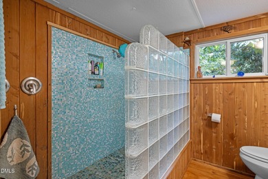 Welcome to a one-of-a-kind retreat nestled on 5.19 acres just