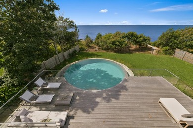 This stunning waterfront home is nestled within a coveted North - photo 16