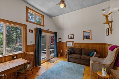 Welcome to a one-of-a-kind retreat nestled on 5.19 acres just