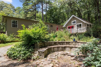 Welcome to a one-of-a-kind retreat nestled on 5.19 acres just