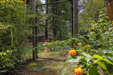 Welcome to a one-of-a-kind retreat nestled on 5.19 acres just