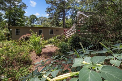 Welcome to a one-of-a-kind retreat nestled on 5.19 acres just