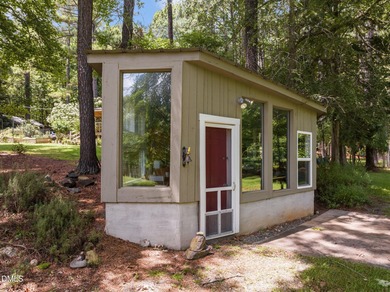 Welcome to a one-of-a-kind retreat nestled on 5.19 acres just