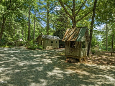 Welcome to a one-of-a-kind retreat nestled on 5.19 acres just