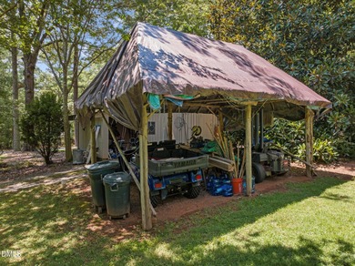 Welcome to a one-of-a-kind retreat nestled on 5.19 acres just