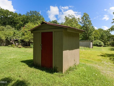 Welcome to a one-of-a-kind retreat nestled on 5.19 acres just