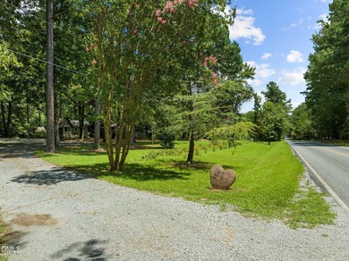 Welcome to a one-of-a-kind retreat nestled on 5.19 acres just