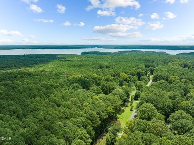 Welcome to a one-of-a-kind retreat nestled on 5.19 acres just