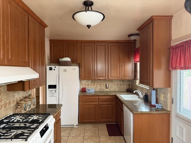Situated on a spacious 7,000+/- sq. ft. corner lot, this home - photo 4