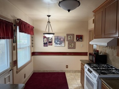 Situated on a spacious 7,000+/- sq. ft. corner lot, this home - photo 5