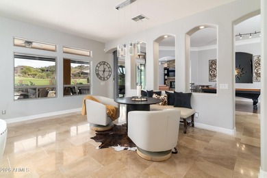 This exceptional home showcases a stunning open-concept design