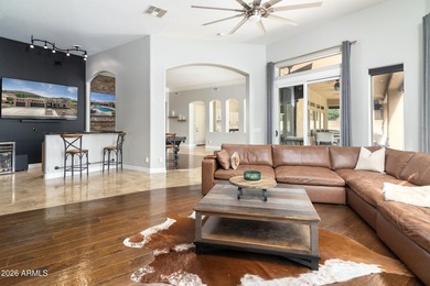 This exceptional home showcases a stunning open-concept design