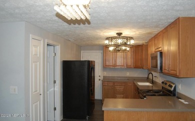 Step into this cozy 3-bedroom, 3-bathroom home nestled in a - photo 4