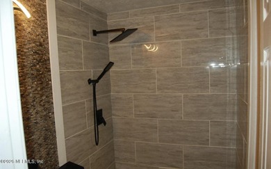 Step into this cozy 3-bedroom, 3-bathroom home nestled in a - photo 10