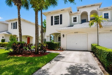 Welcome to this WATERFRONT END UNIT TOWNHOME in Emerald Lakes of - photo 1