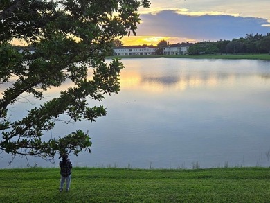 Welcome to this WATERFRONT END UNIT TOWNHOME in Emerald Lakes of - photo 3