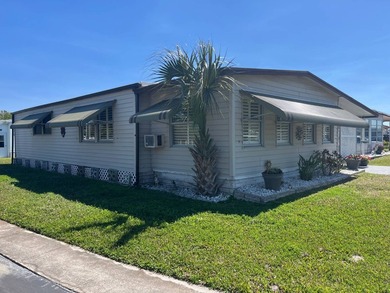 This fully furnished 2 Bed/2 Bath on a corner lot offers a sense - photo 2