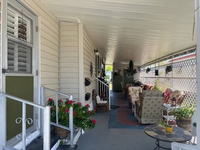 This fully furnished 2 Bed/2 Bath on a corner lot offers a sense - photo 4