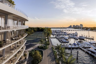 Remarkable unit at a private island in Coconut Grove. Boutique