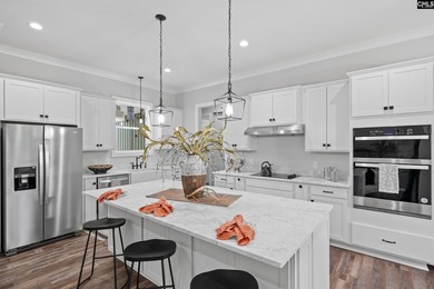 New construction lake access home in the new lakefront community - photo 13