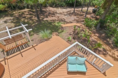 NO HOA AND OVER A HALF ACRE LOT! Bordered by lush vegetation and - photo 20