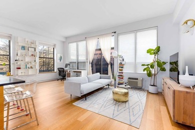 This truly one-of-a-kind corner one-bedroom is a rare find in - photo 2