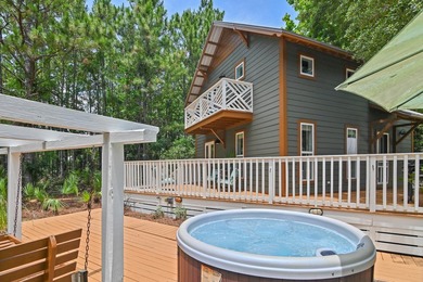 NO HOA AND OVER A HALF ACRE LOT! Bordered by lush vegetation and - photo 26