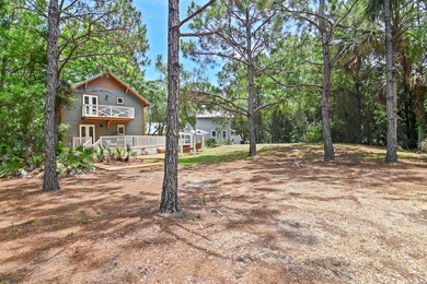 NO HOA AND OVER A HALF ACRE LOT! Bordered by lush vegetation and - photo 28