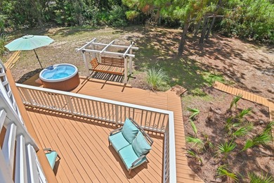 NO HOA AND OVER A HALF ACRE LOT! Bordered by lush vegetation and - photo 32