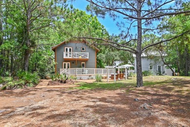 NO HOA AND OVER A HALF ACRE LOT! Bordered by lush vegetation and - photo 34