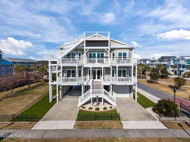 Set across two full lots in The Peninsula at Ocean Isle Beach