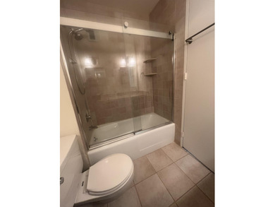 BRIGHT AND SUNNY,TASTEFULLY RE-IMAGINED OPEN-PLAN ONE BEDRM/1.5