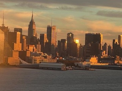 BRIGHT AND SUNNY,TASTEFULLY RE-IMAGINED OPEN-PLAN ONE BEDRM/1.5