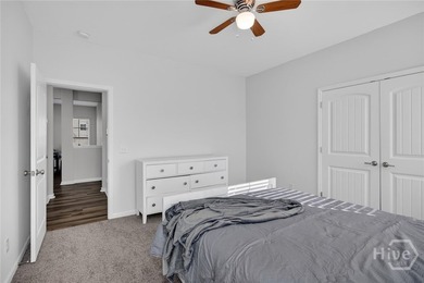 The Dayton is a spacious two story single family home in the - photo 8