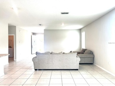 This well-maintained property offers 3 bedrooms, 2 full - photo 6