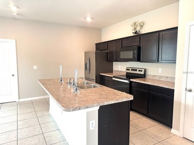 This well-maintained property offers 3 bedrooms, 2 full - photo 8