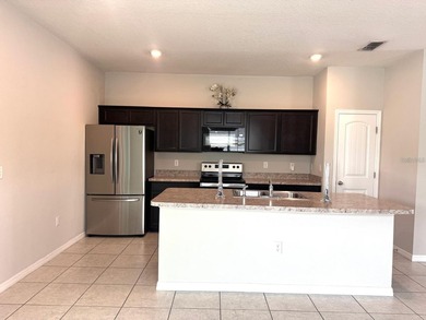 This well-maintained property offers 3 bedrooms, 2 full - photo 9