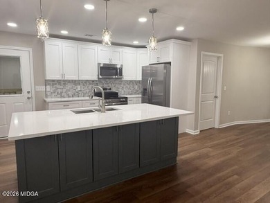 All Brick spacious home totally renovated. New kitchen with - photo 11