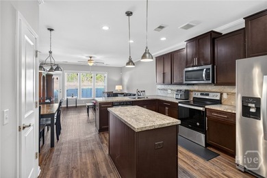 Looking for a townhome that offers space, flexibility, and - photo 4