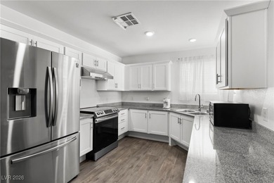 Welcome to this unique corner-unit townhome that seamlessly