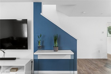 Welcome to this unique corner-unit townhome that seamlessly