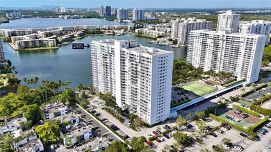 Stunning top-floor corner unit offering breathtaking wraparound - photo 16