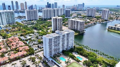 Stunning top-floor corner unit offering breathtaking wraparound - photo 17