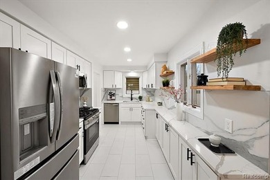 Welcome home to this beautifully updated three-bedroom, two - photo 20