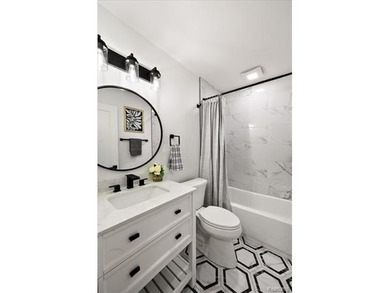 Welcome home to this beautifully updated three-bedroom, two - photo 26