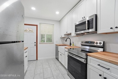 This 3-bedroom, 2-bath home is full of character and ready for - photo 2