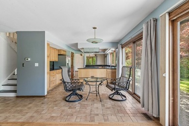 This contemporary 5-bedroom, 2.5-bath home sits on 1.4 wooded - photo 16